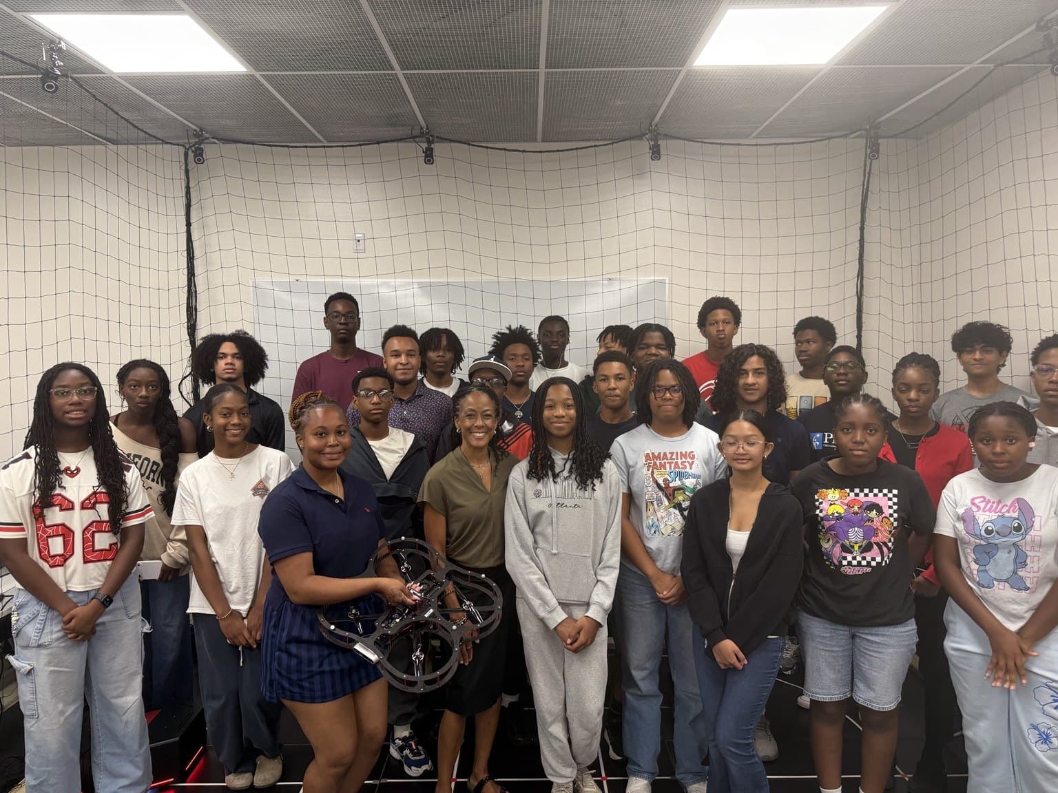 A group photograph with Dean Kimberly Jones in the AVRC research studio.